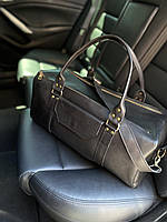 Дорожня сумка в чорному кольорі