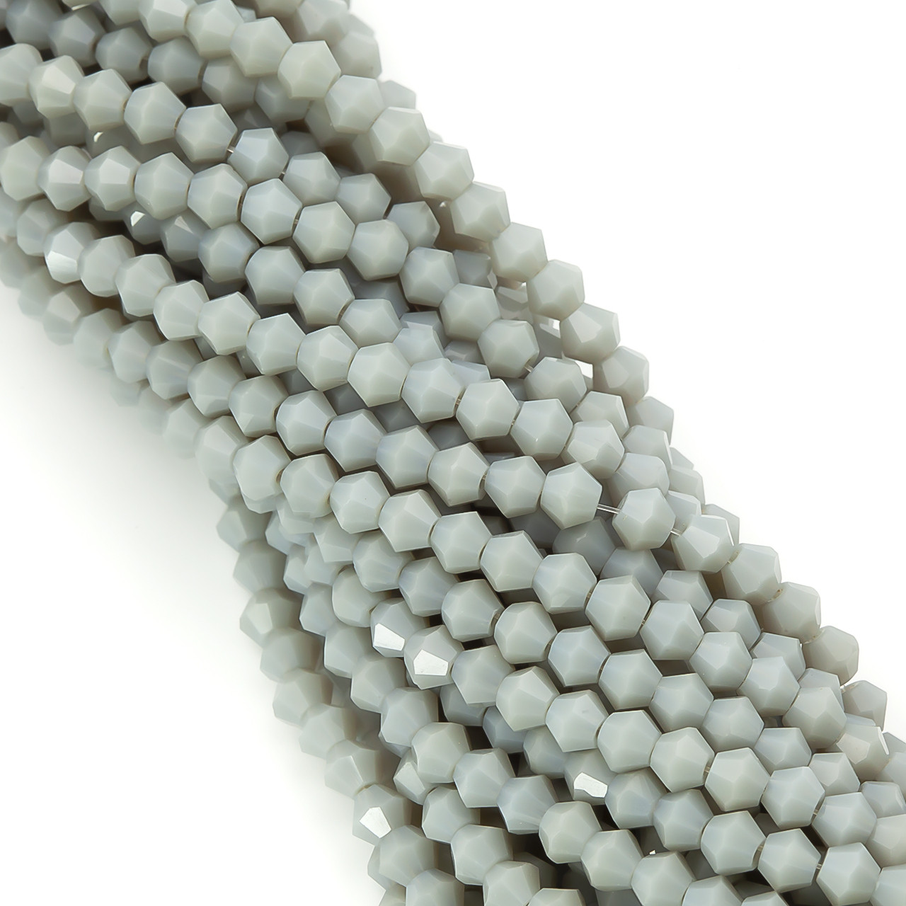 Намистини кришталеві Біконус 4х4,2 мм Ø 1 мм (+-95 шт.) Сірий непрозорий, фото 1