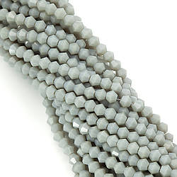 Намистини кришталеві Біконус 4х4,2 мм Ø 1 мм (+-95 шт.) Сірий непрозорий