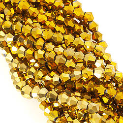 Намистини кришталеві Біконус 4х4,2 мм Ø 1 мм (+-95 шт.) Золотистий