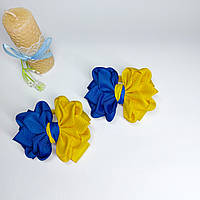 Банти для волосся. Бантики на ризинці