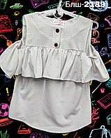Блузка для дівчинки в білому кольорі в горошок з воланом