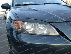 Вії Мазда 3 Bk седан (накладки на передні фари Mazda 3 Bk верхні)
