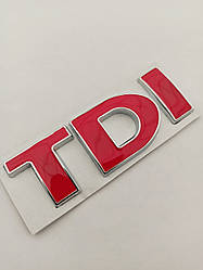 Емблема - напис TDI 76*26 мм червоний