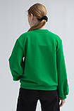 Oversize світшот для дівчинки зеленого кольору з об'ємними рукавами та чорною вишивкою р. 104-170, фото 5