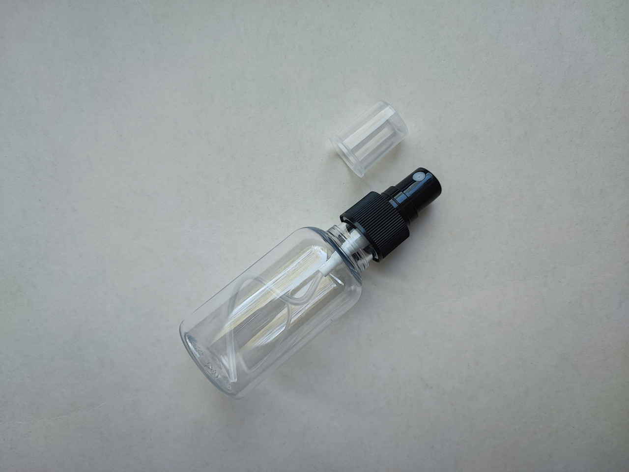 50 - 55 мл ПЕТ круглий прозорий з чорним розпилювачем 20/410 флакон пластиковий, пластмасовий в комплекті