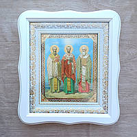 Ікона Василія Великого, Іоанна Златоуста, Григорія Богослова, лик 15х18 см, у білому фігурному дерев'яному кіоті, тип 3