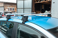 Перемычки багажник на гладкую крышу на Opel Astra J 2010 гг. (2 шт, Asaf V4)