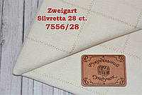 Тканина рівномірного переплетіння Zweigart 7556/28 Silvretta 28 ct. Antique White Gold/Молочний з золотим люре 1 м/пог