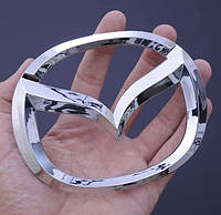 Эмблема значек для Mazda 124х100 мм на капот багажник решетку LD4751731