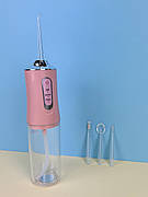 Електричний портативний іригатор ротової порожнини "Portable Oral Irrigator" KRD-1948 рожевий