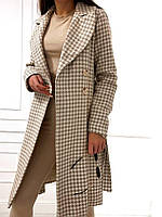 Женское кашемировое пальто на подкладке с карманами и пояском.