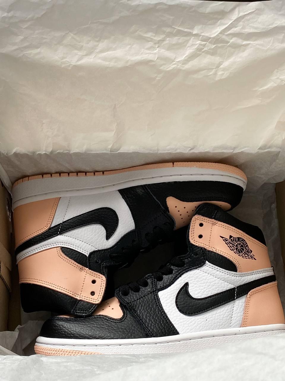 Peach and black best sale jordans