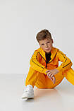 Спортивний костюм для хлопчика худі з капюшоном на блискавці та штани для школярів жовтого кольору 116, фото 7