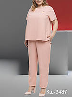 Костюм жіночий брючний вільного крою у пудровому кольорі льон жатка розміри 52  58