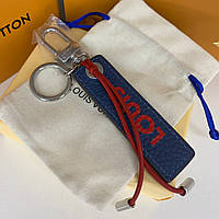 Брелок Луи Виттон Louis Vuitton синий кожаный с красной надписью