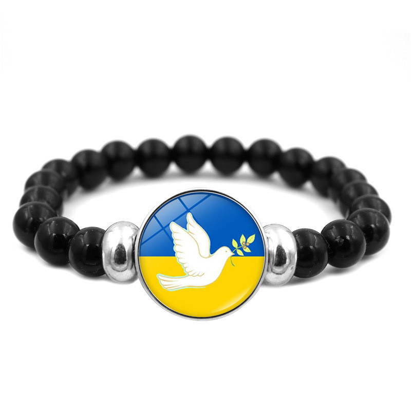 Браслет на руку патріотичний з голубом , браслет чорний ручної работи. Розмір 18-22 см