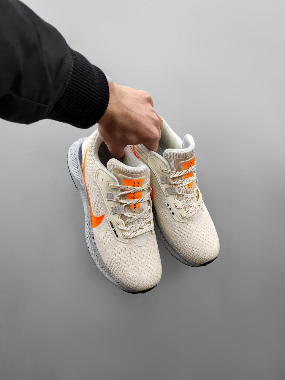 Orange hotsell nike 200