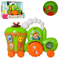 Музична іграшка Трактор на колесах 598 навчальний, музика, звук російською, світло