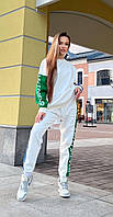 Женский спортивный теплый костюм на флисе с зауженными брюками и свитшотом