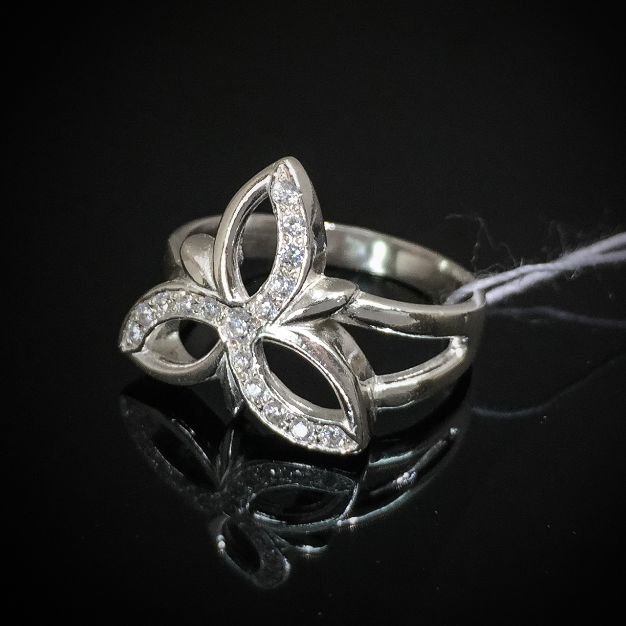 Срібне кільце у формі квітки зі вставками з фінішу