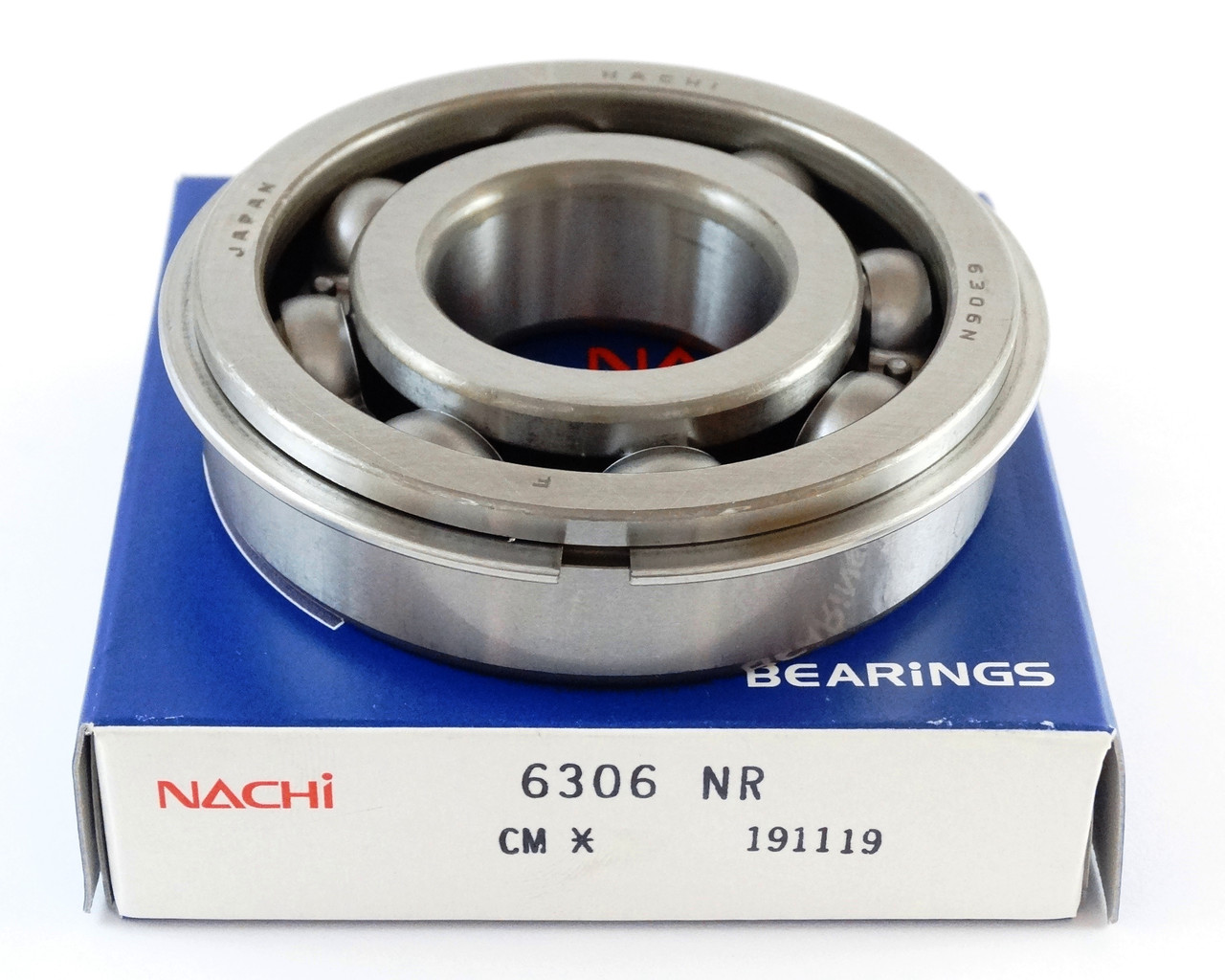 50306 (6306 NR) підшипник Nachi Японія (з проточкою під стопорне кільце + стопорне кільце)
