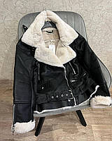 Жіноча чорна дублянка косуха з білим хутром