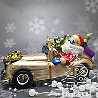 Стеклянная елочная игрушка Санта Клаус на машине Komozja Family Mostowski Santa Claus