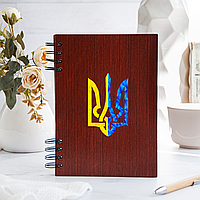 Книга для записей в деревянном переплете с гербом Украины