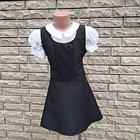 Класичний сарафан для дівчинки, прикрашений блискітками.