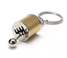 Дизайнерський брелок, мініатюра — "Коробка передач із кулісою", золотистий колір