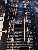 Длинные клипсы серьги сережки (без прокола) золотистый металл цепи и мелкий жемчуг сверху и снизу