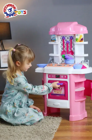 Дитяча кухня іграшкова для дівчинки ТехнОк рожева 81 х 51 см з електронним модулем