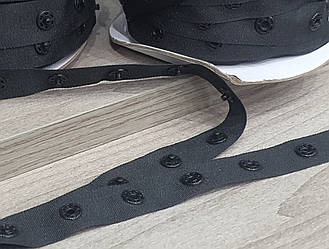 Кнопки пластикові на тканинній стрічці (боді) колір чорний (нейлон)