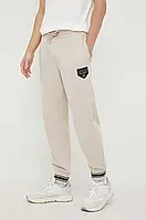 Urbanshop com ua Спортивні штани Armani Exchange колір коричневий з аплікацією РОЗМІР ЗАПИТУЙТЕ