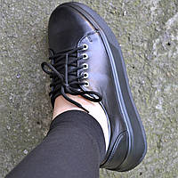 Шкіряні кросівки жіночі