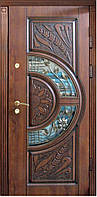 Двері вхідні зі склопакетом і ковкою, з об'ємним різбленням і патиною