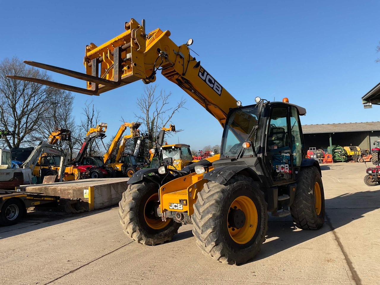 Екскаватор-навантажувач JCB 550-80