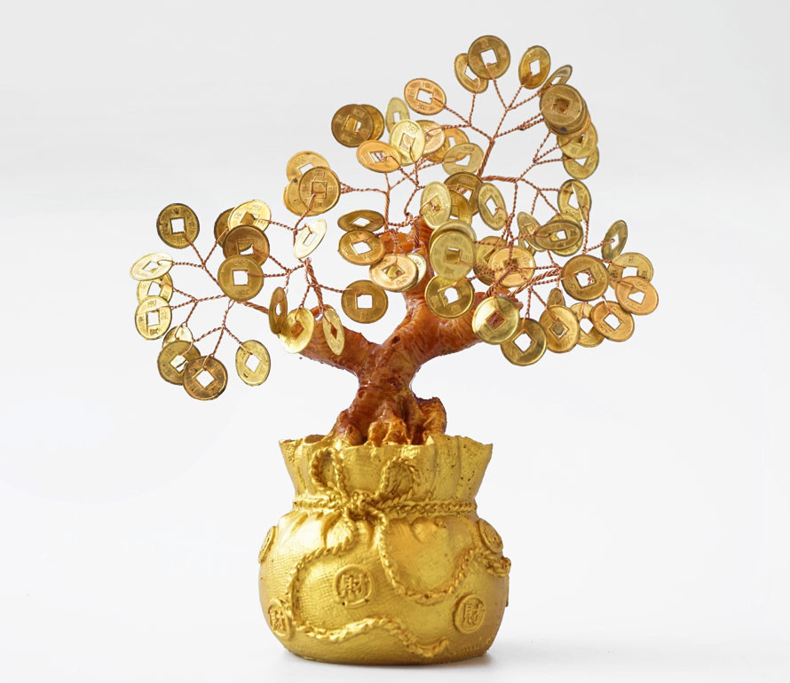 Грошове дерево з золотими монетами в мішку