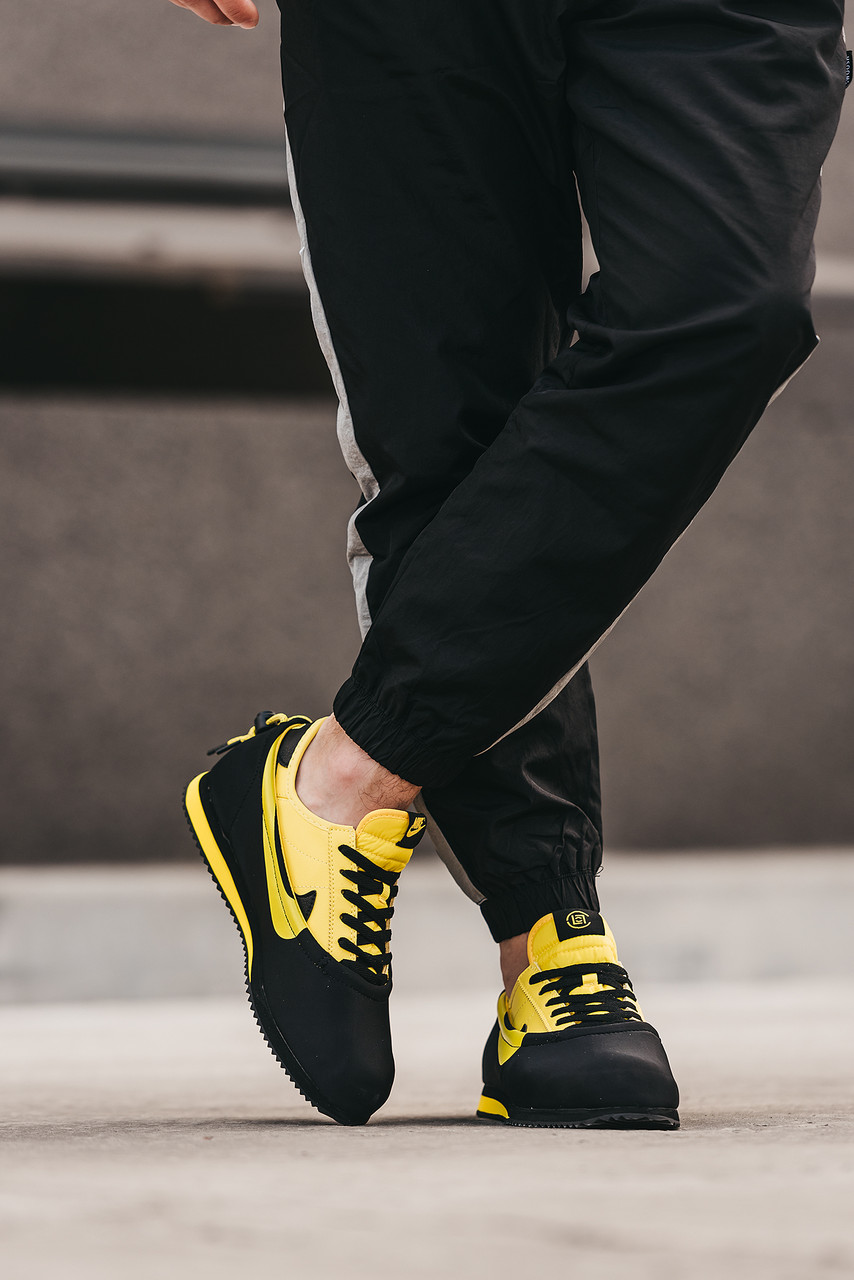 Nike cortez black yellow discount