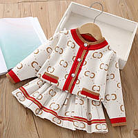 Дитячий теплий в'язаний костюм для дівчинки: кофта та спідниця, білий