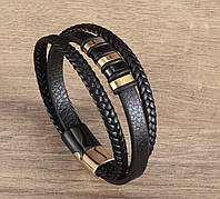 Черный кожаный браслет с золотистыми металлическими вставками и магнитным замком