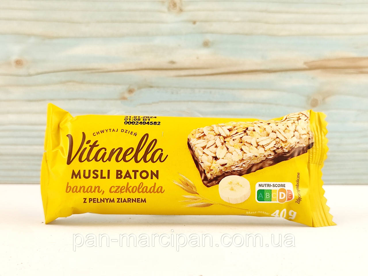 Батончик злаковий із бананом і молочним шоколадом Vitanella 40 г Польща, фото 1