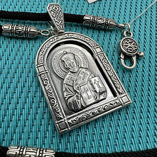 Чорний шовковий шнурок зі вставками зі срібла та ладанка Святий Миколай 925 проба