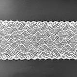 Стрейчеве (еластичне) мереживо білого кольору (теплий відтінок) шириною 22,5 см., фото 3