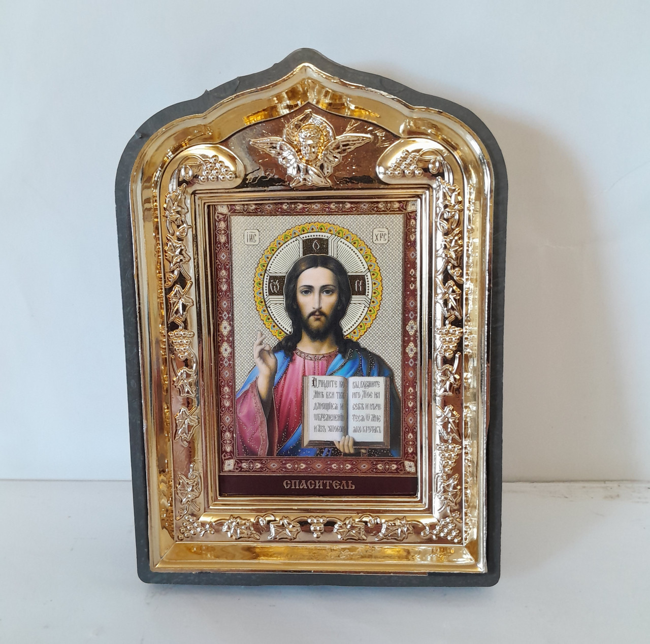 Ікона Спаситель, лик 6х9, у пластиковій чорній рамці