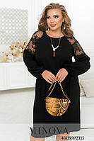 Ошатна чорна сукня-міді з мереживними вставками на рукавах та прикрасою, великих розмірів від 46 до 68