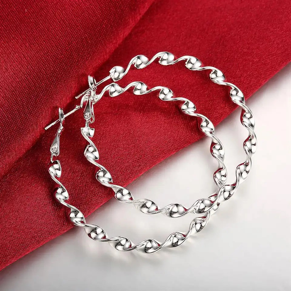 Сережки кільця сріблясті рельєфні 5 см