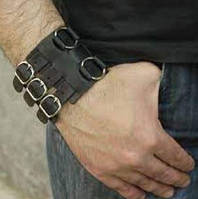 Широкий мужской браслет-манжета из натуральной кожи "Байкер" с металлическими декоративными кольцами