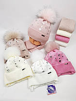 Дитячі польські зимові в'язані шапки на флісі з зав'язками і помпоном оптом для дівчат, р.44-46, Grans